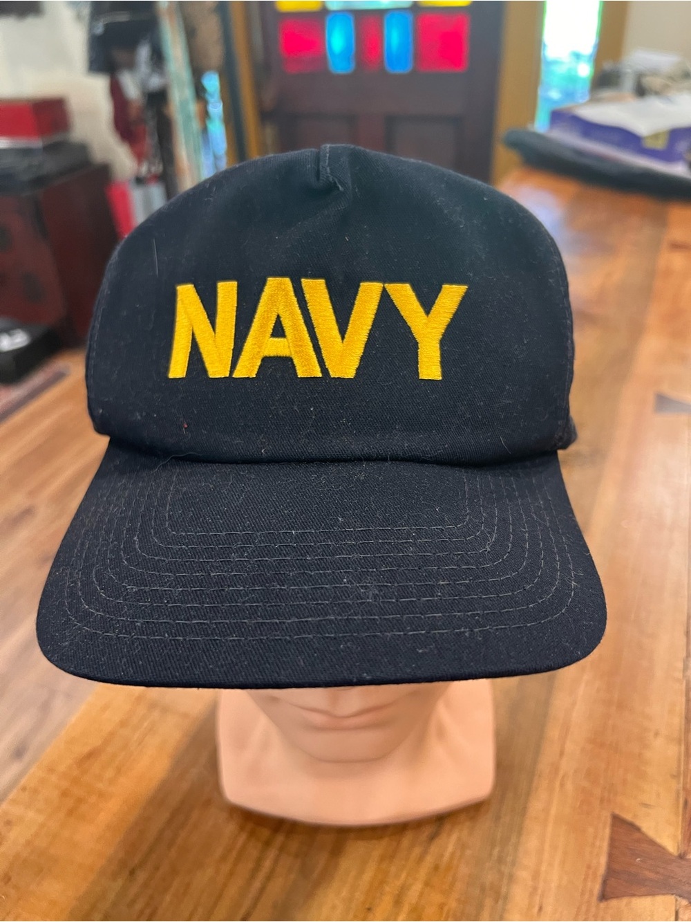 NAVY Embroidered Black Hat with Yellow Lettering